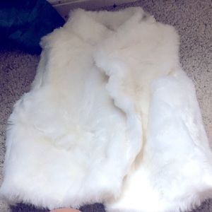 small baby white fuzzy and soft vest from Carter’s